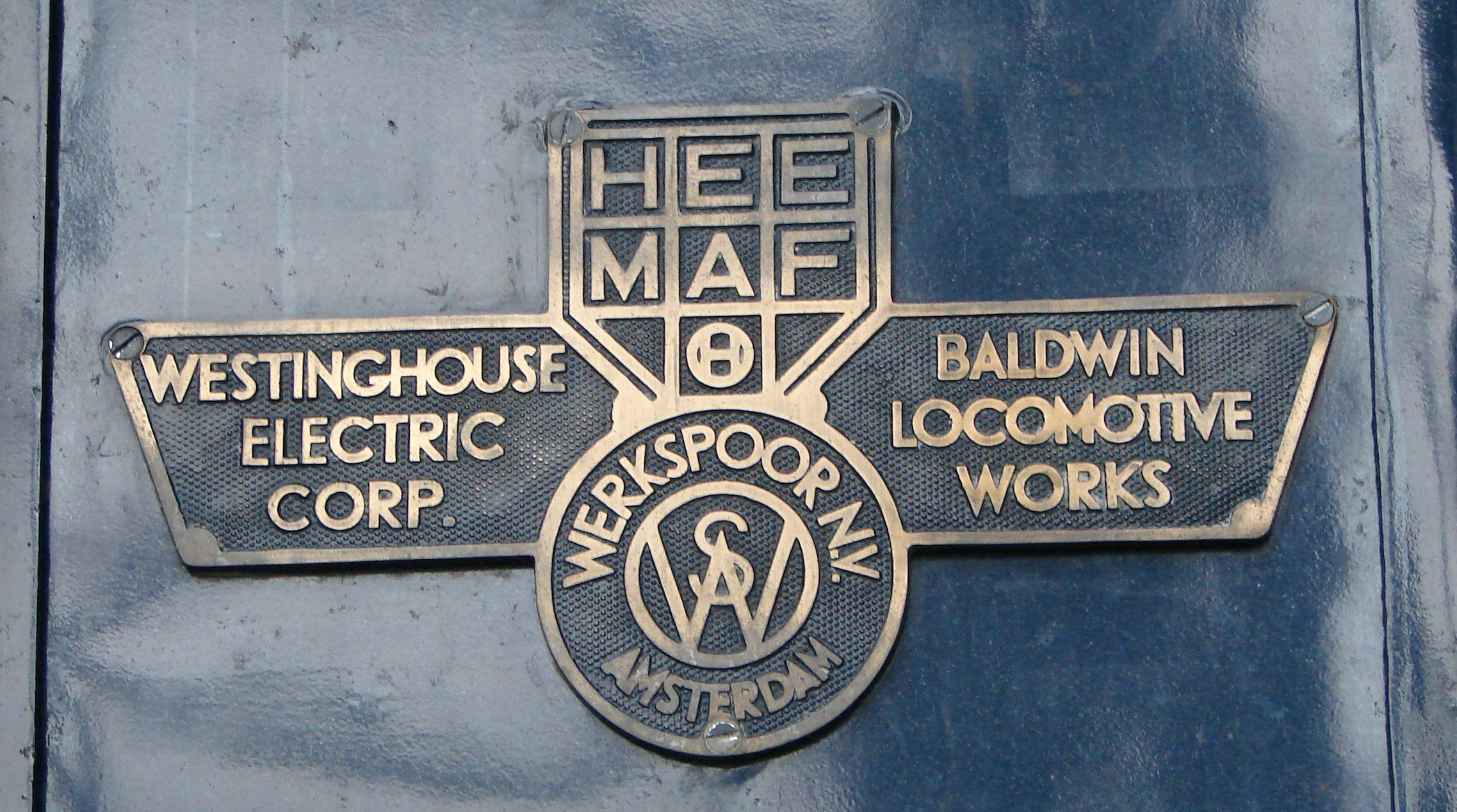 Logo Heemaf/Werkspoor/Westinghouse t.b.v. de 1200 serie.